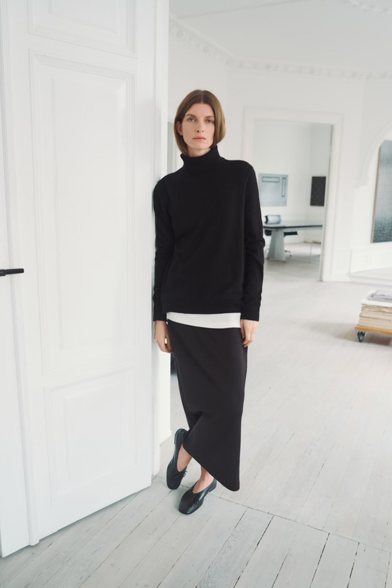 InWear AidaI skirt styled with relaxed black jumper For a comfortable work outfit