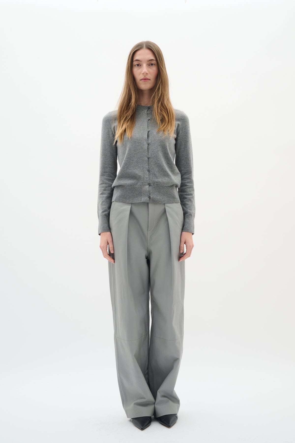Full-body front view of model wearing InWear Kellsie grey wool-blend cardigan and smart trousers