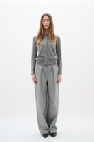 Full-body front view of model wearing InWear Kellsie grey wool-blend cardigan and smart trousers