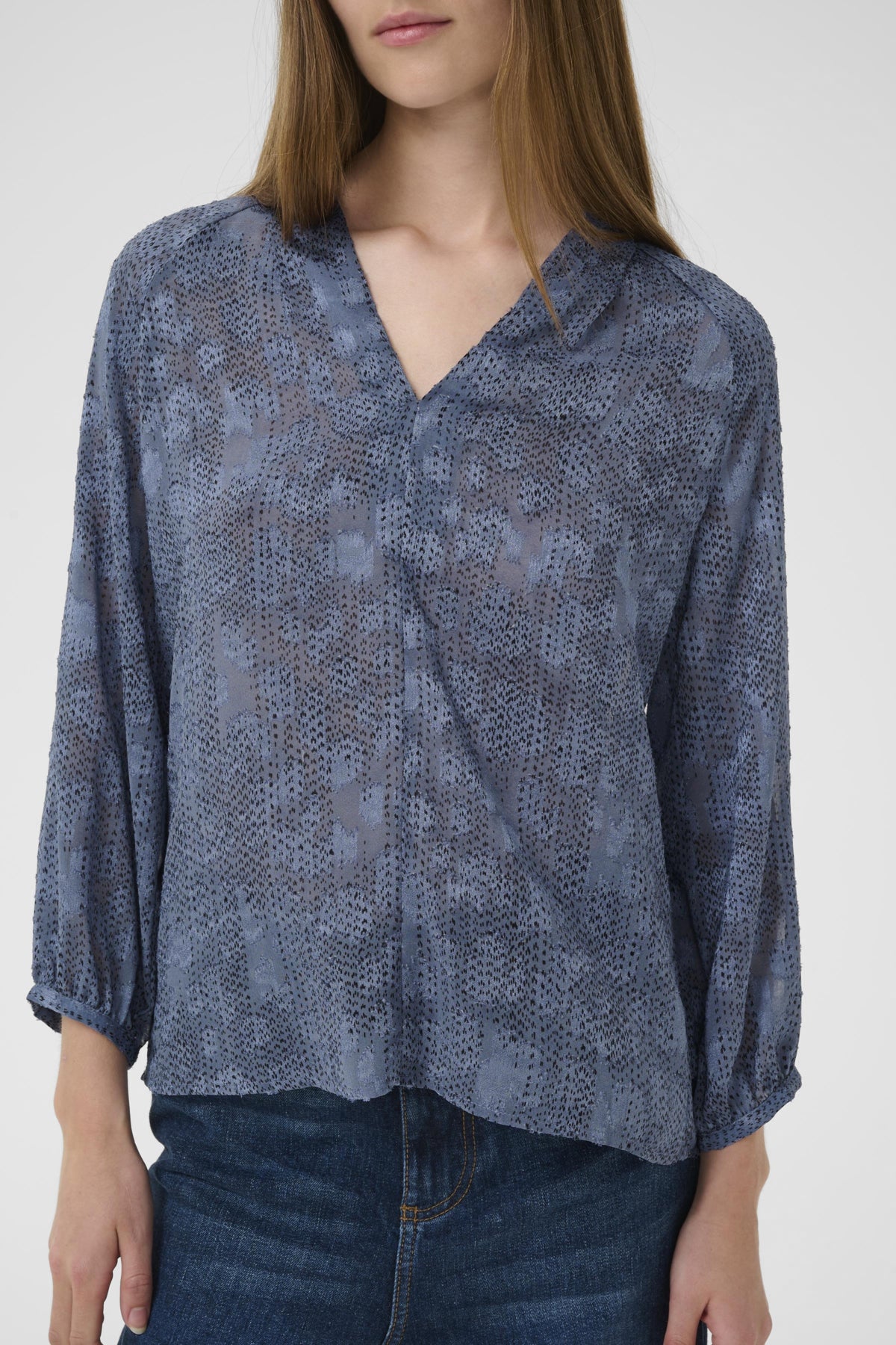 Inwear AddisonIW Blue Dot Print Blouse on woman, close-up front view showing V-neck and drape.