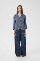 Inwear AddisonIW Blue Dot Print Blouse on woman, full-body front view styled with wide-leg trousers.