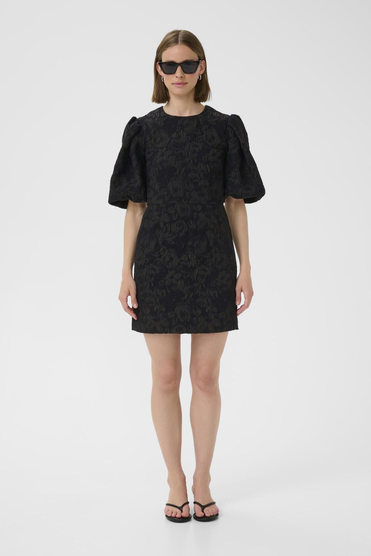 Close-up of puff sleeve and brocade texture on InWear Brill mini dress