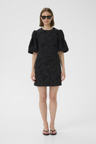 Close-up of puff sleeve and brocade texture on InWear Brill mini dress