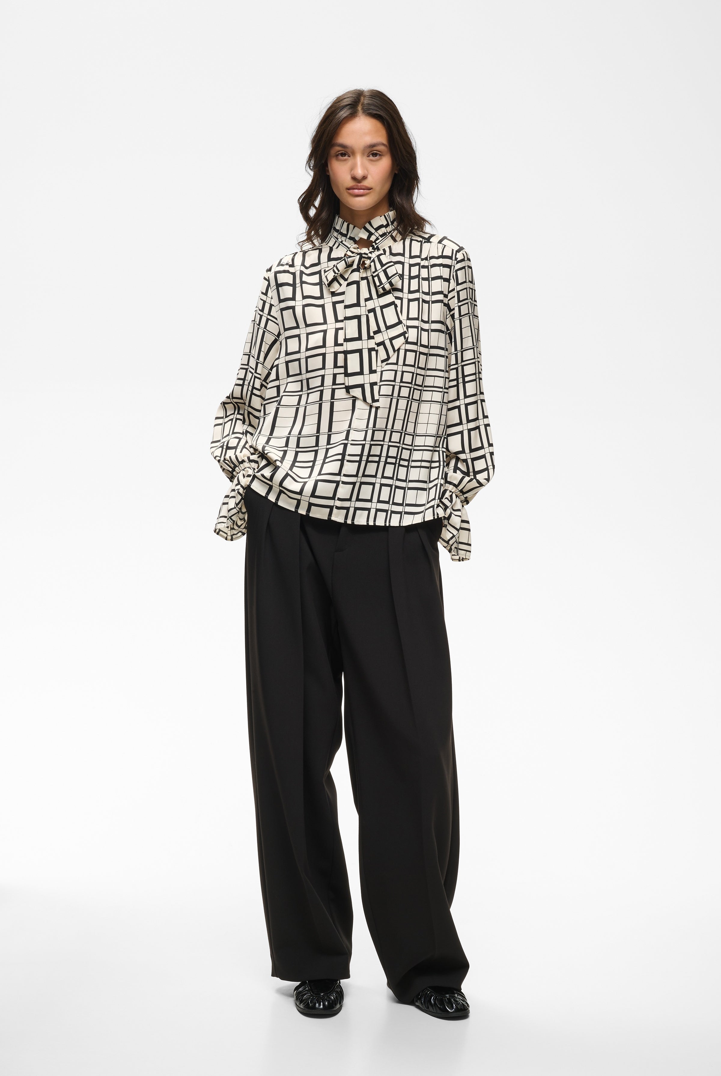 InWear Gracie cream printed blouse styled with black tailored trousers