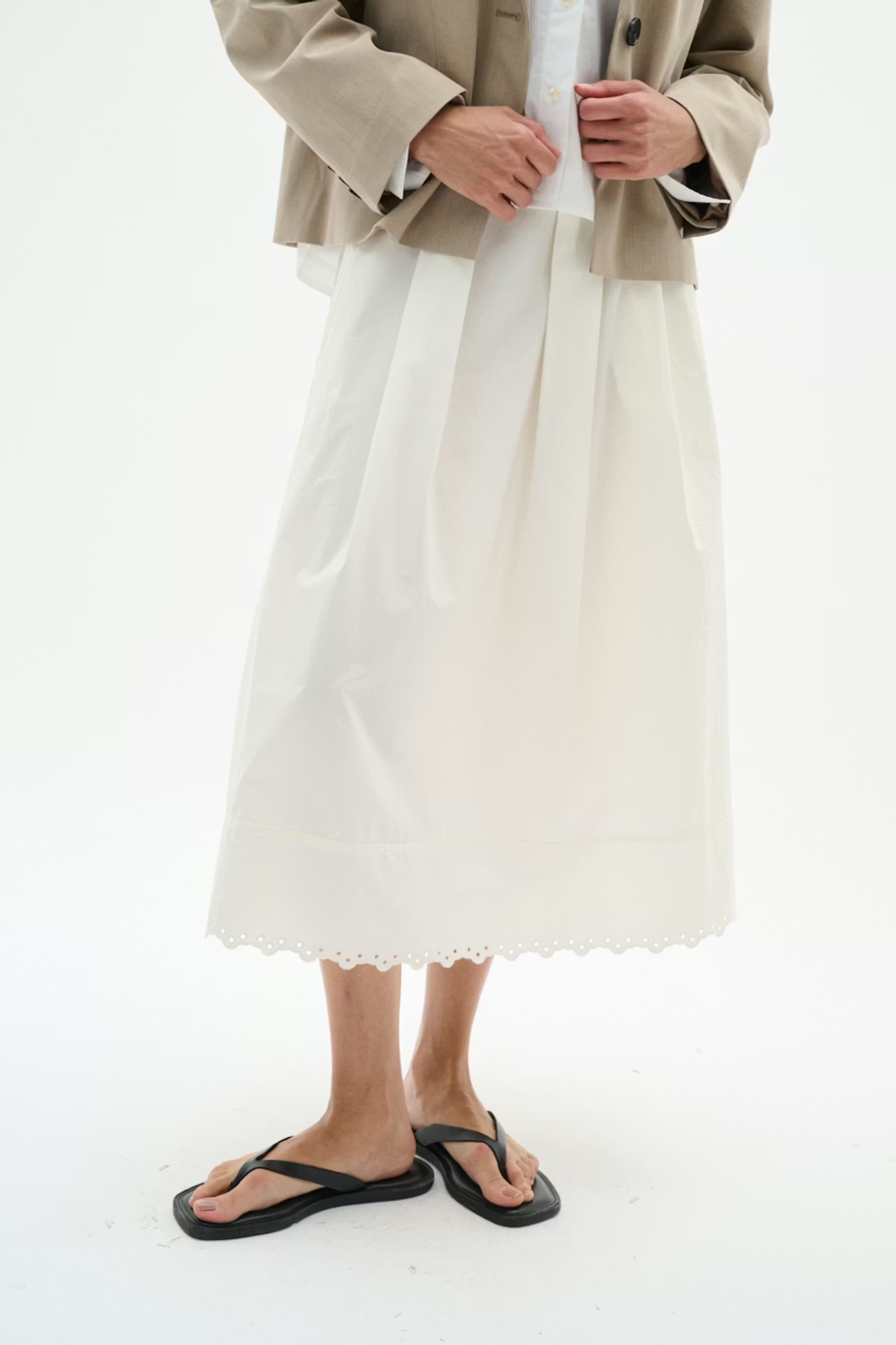 InWear cream midi skirt scalloped hem detail close up