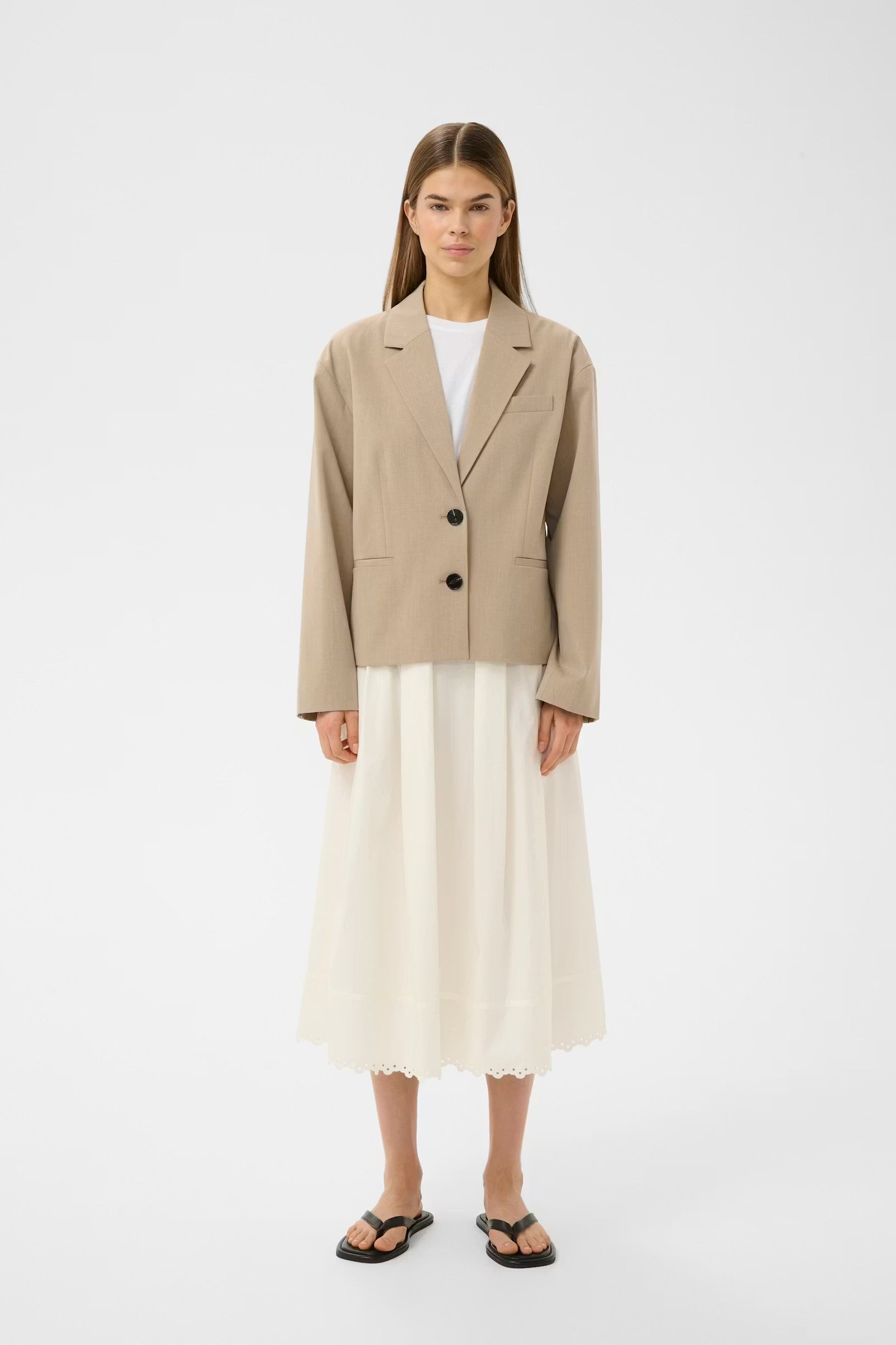InWear cream midi skirt styled with beige blazer front view