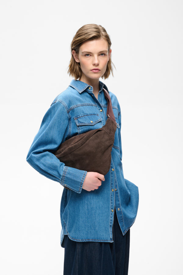 InWear Rasida brown suede crossbody sling bag styled on model