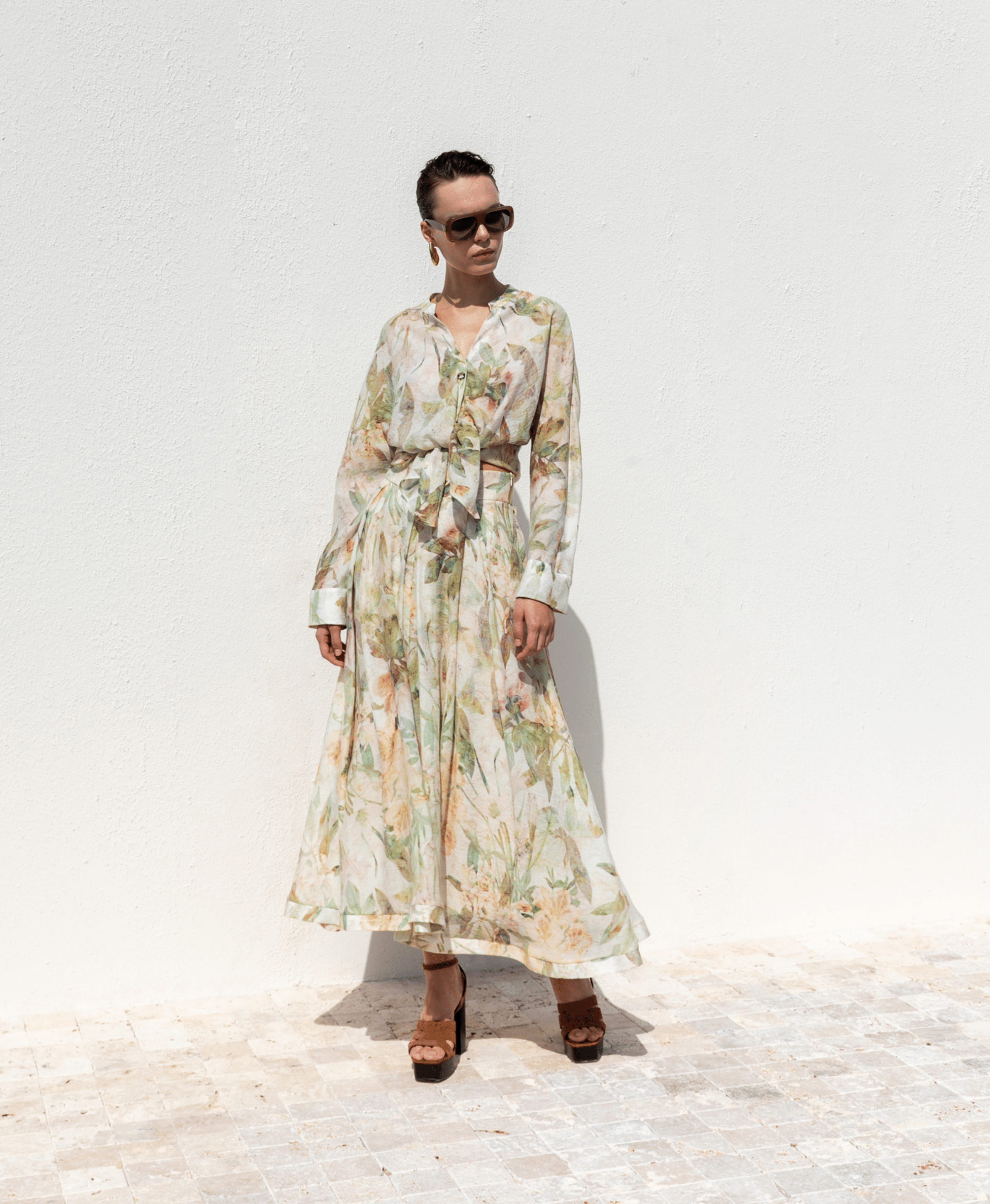 Kameya green and cream botanic print midi skirt front view with flowing A-line silhouette