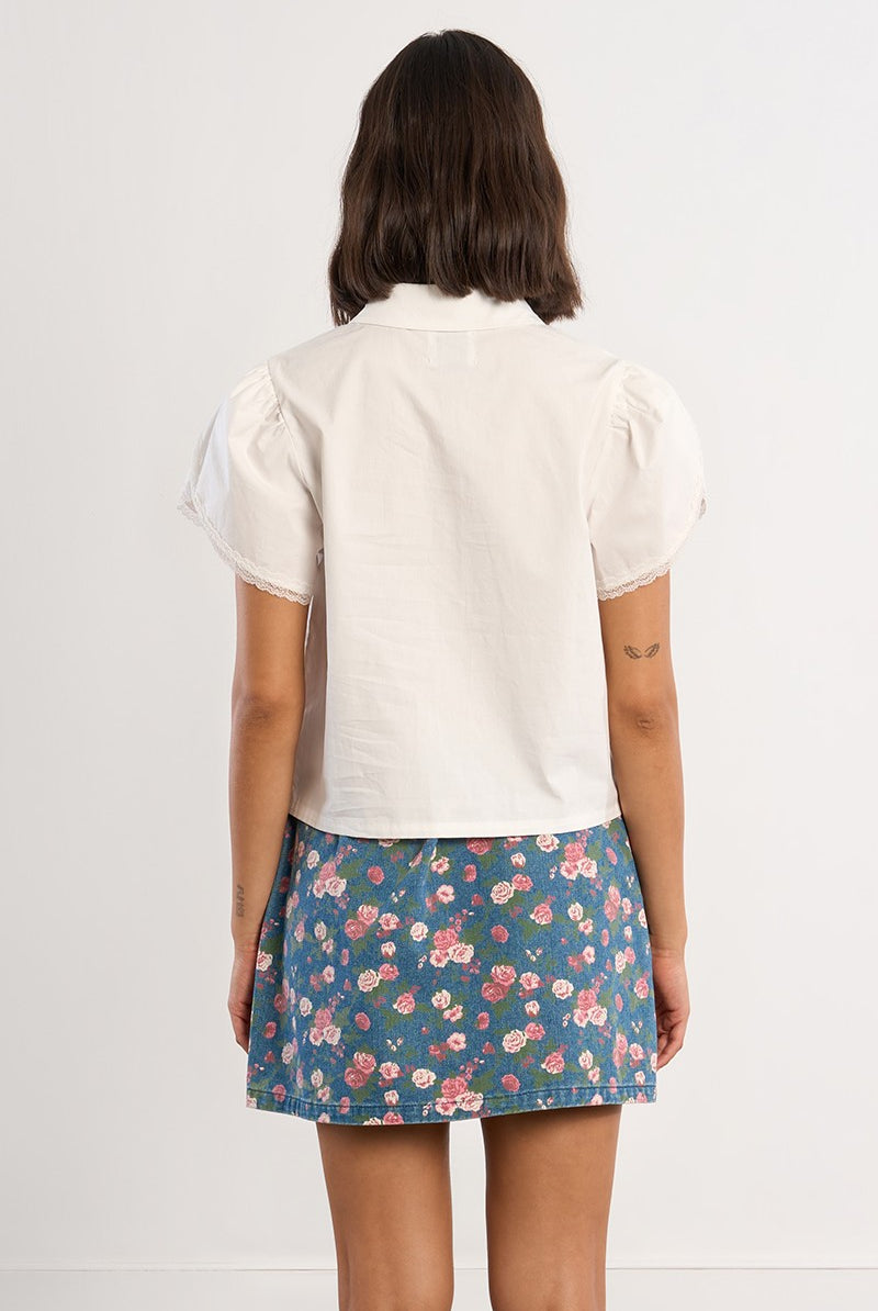 Lili Sidonio short sleeved white shirt back view
