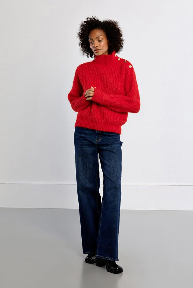 Lili Sidonio red fluffy button detail jumper styled with jeans