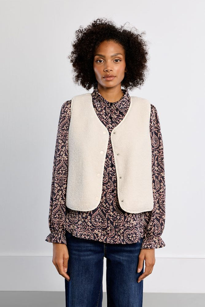 Lili Sidonio cream faux sheepskin sleeveless vest front view