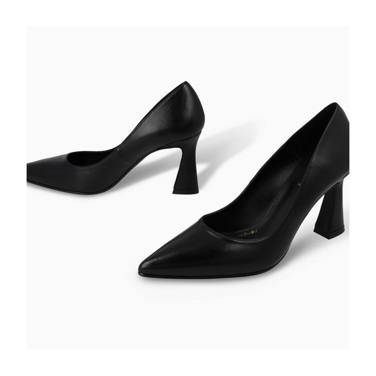 Lodi Roa black leather pointed toe heels shown from a three-quarter angle