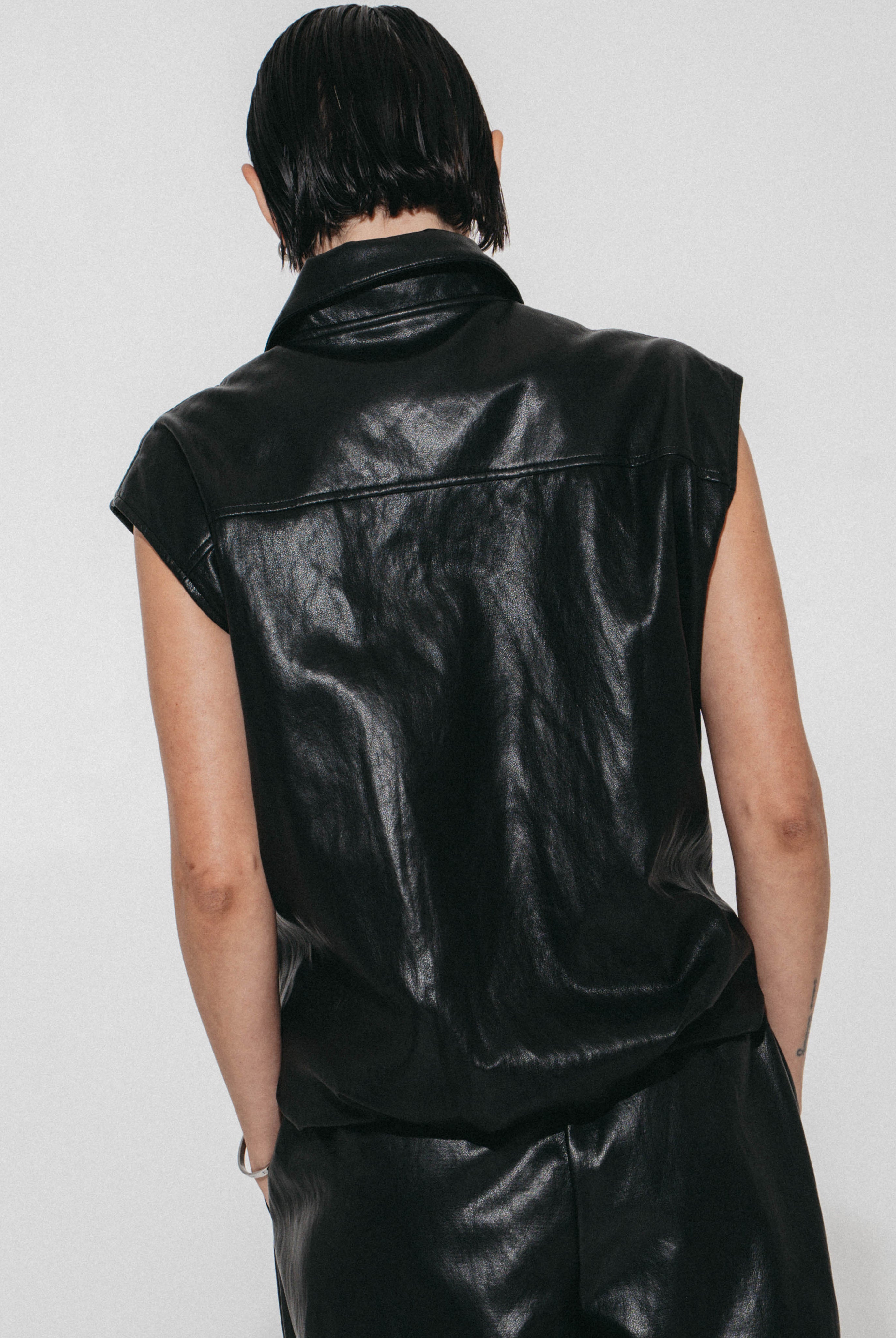 Luje Alora black faux leather vest back view