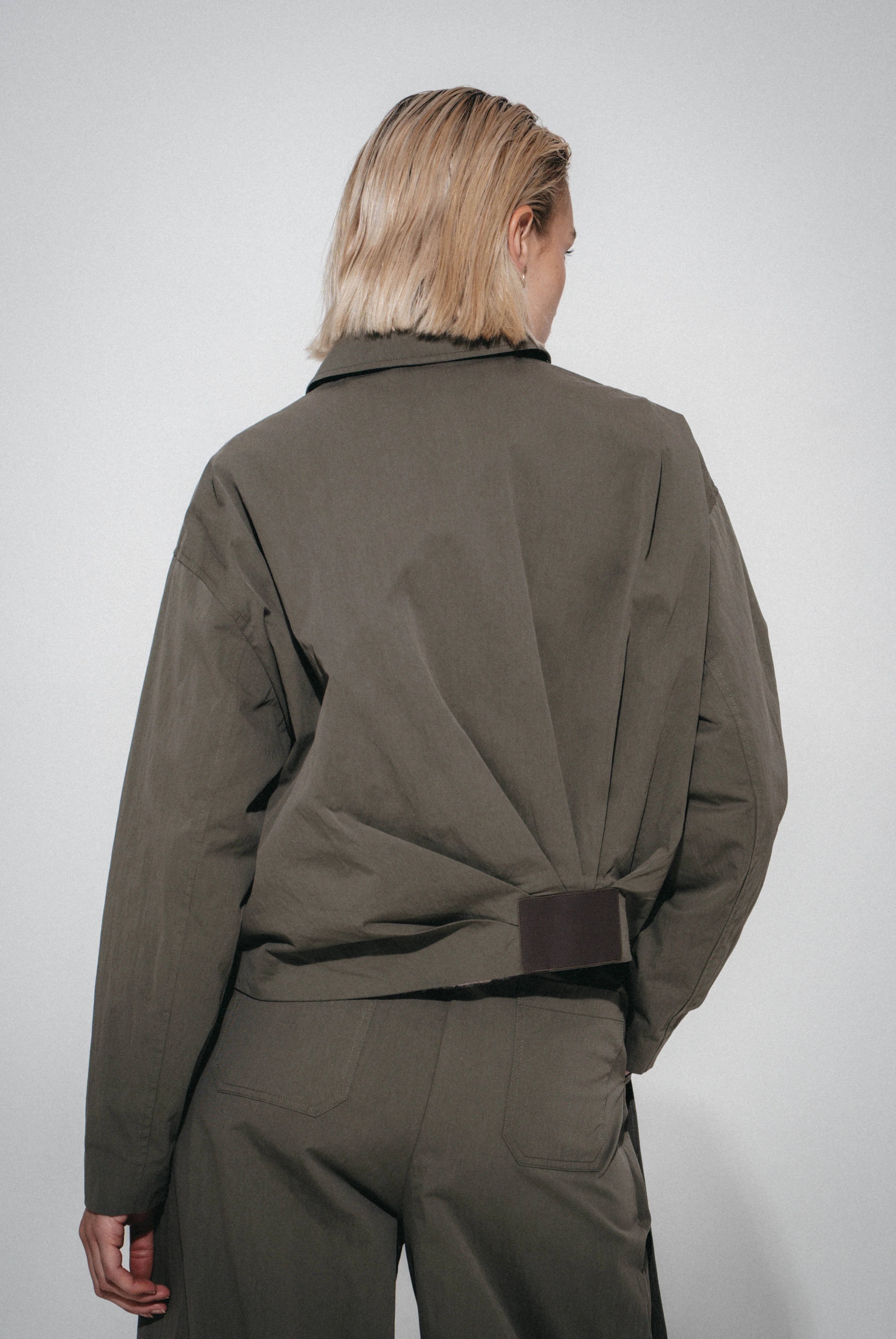 Luje Blaze khaki bomber jacket back pleat detail