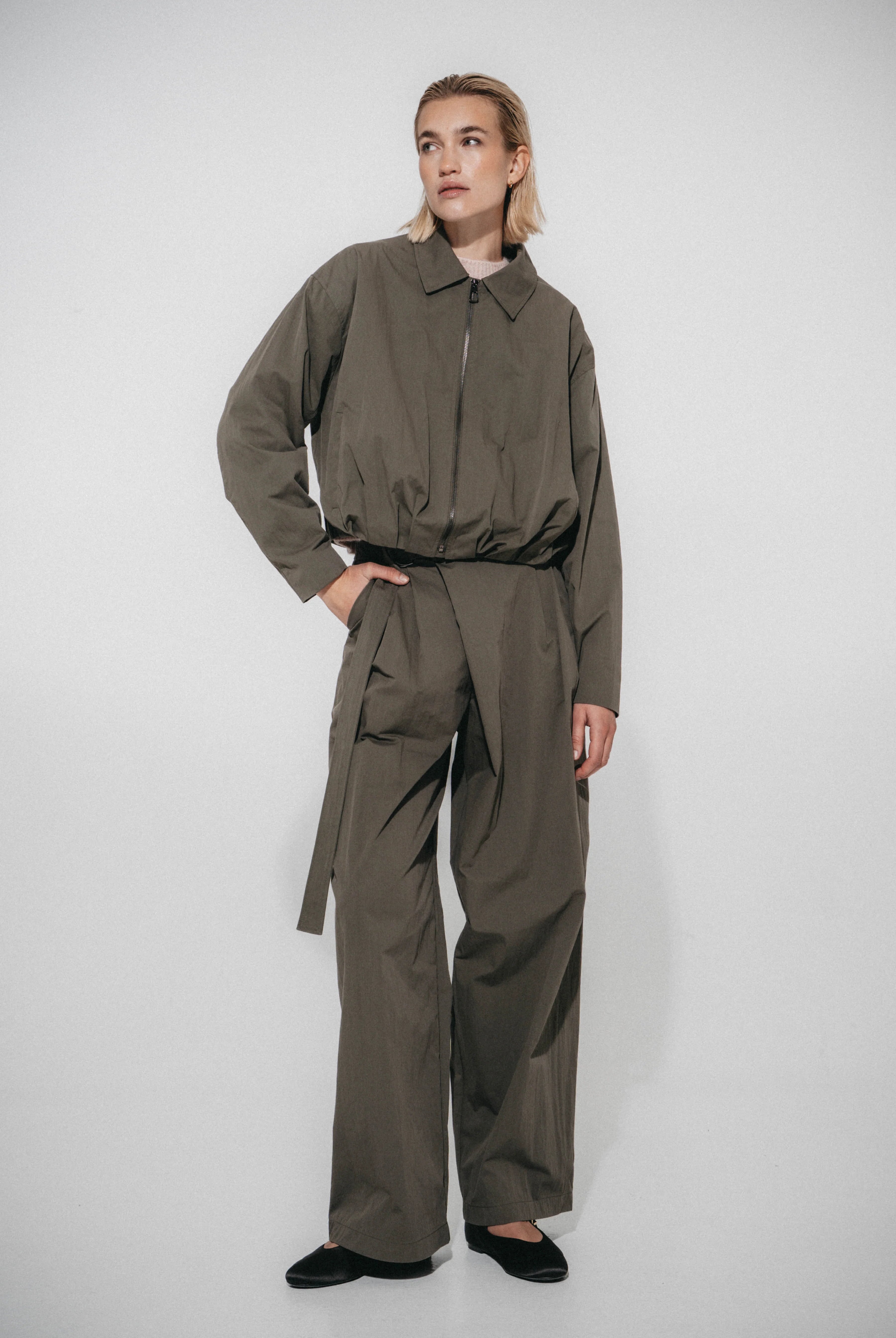 Luje Blaze pleated khaki bomber jacket full-length front view
