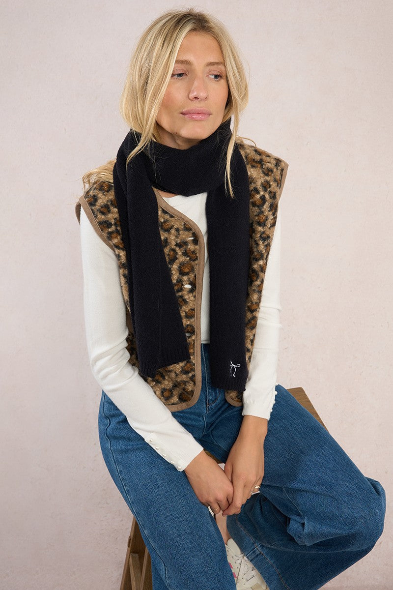 Molly Bracken black scarf paired with leopard print and blue denim