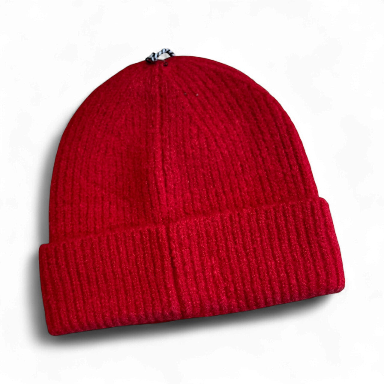 Rear view of Molly Bracken red beanie hat with turn down detail