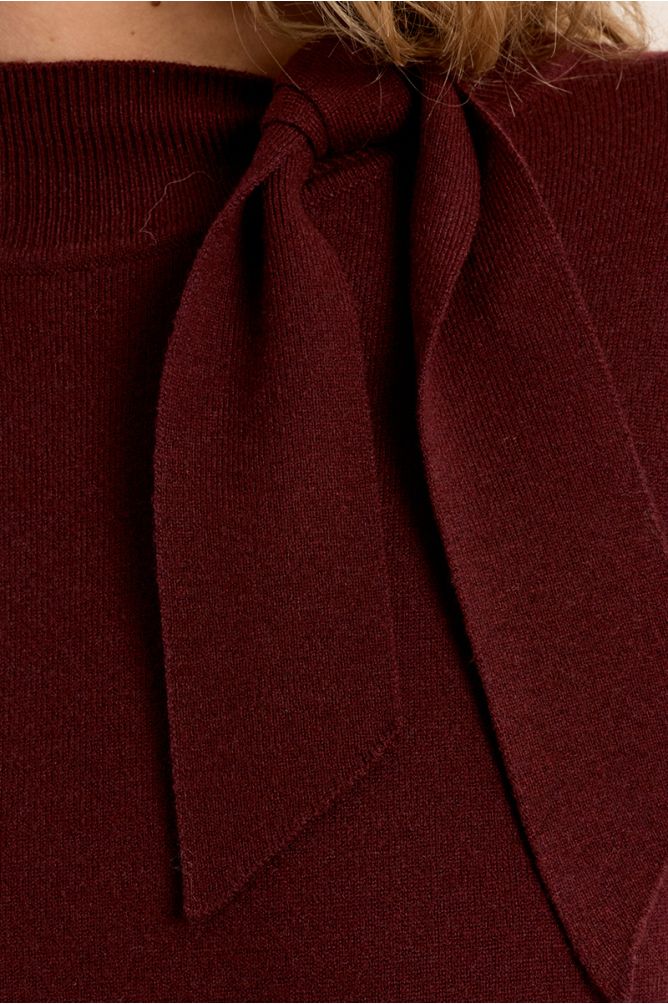 Molly Bracken burgundy jumper bow shoulder detail close-up