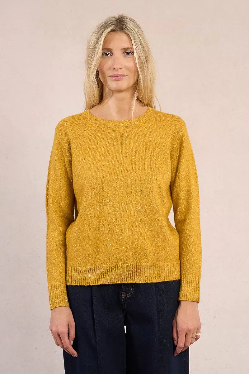 Model wearing Molly Bracken yellow jumper with metallic thread