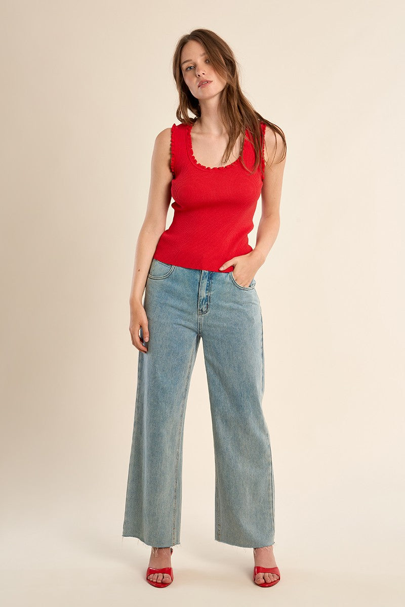 Molly Bracken red fitted ribbed vest top with denim jeans