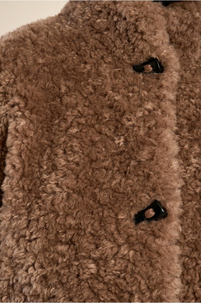 Molly Bracken brown faux sheepskin jacket texture and toggle detail close-up