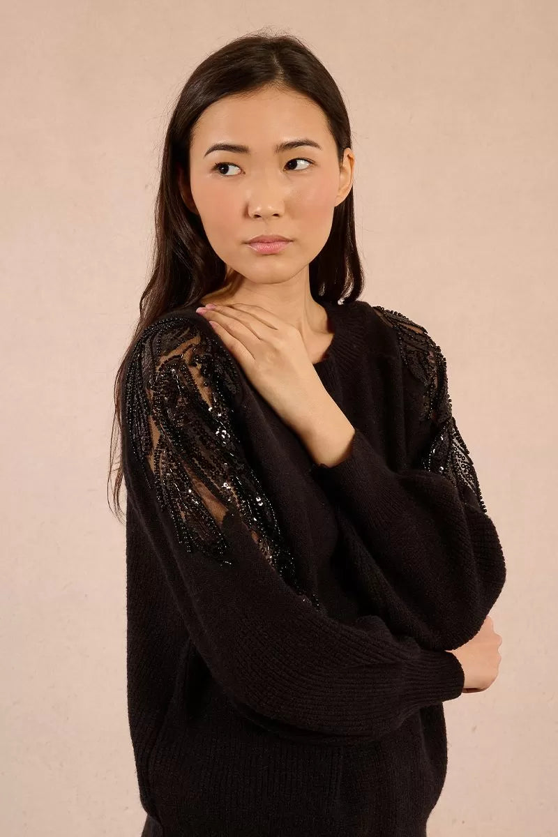 Front view of black Molly Bracken knit sweater with lace and rhinestone shoulders