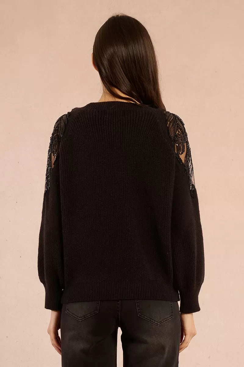 Back view of black lace shoulder knit jumper with scoop neckline