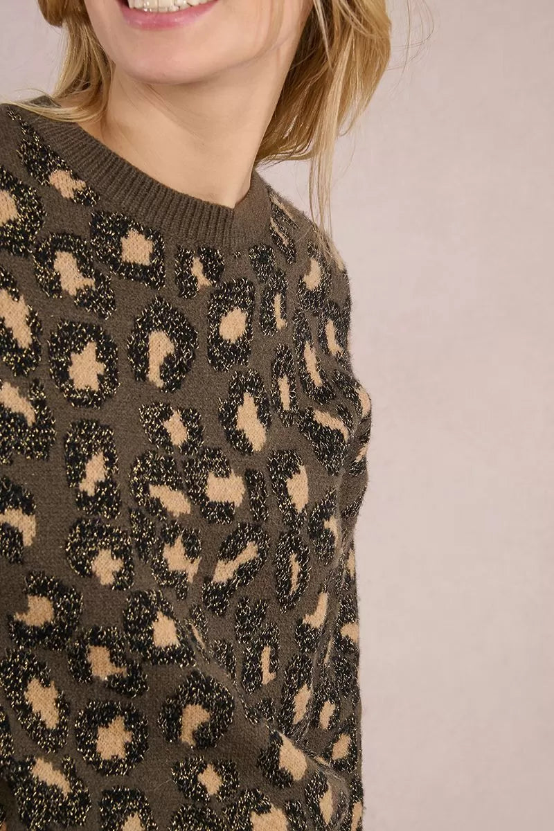 Close-up of Molly Bracken khaki knit fabric and animal motif detail