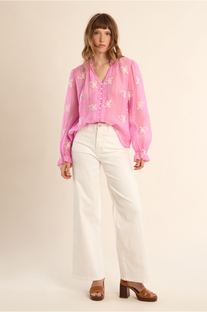 Molly Bracken pink semi sheer blouse styled with cream trousers