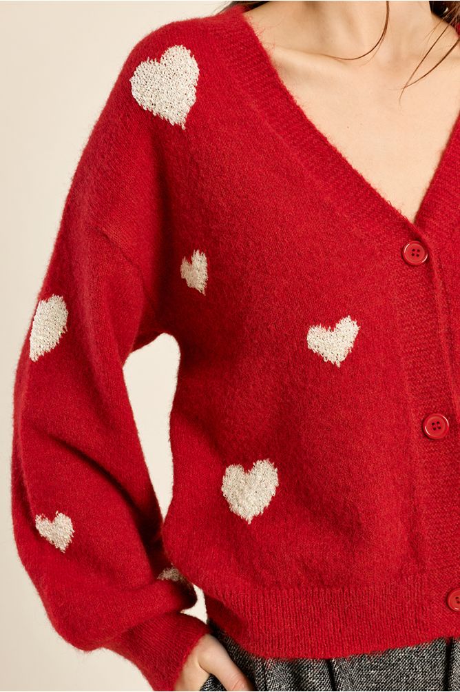 Molly Bracken women’s red heart cardigan styled with grey trousers