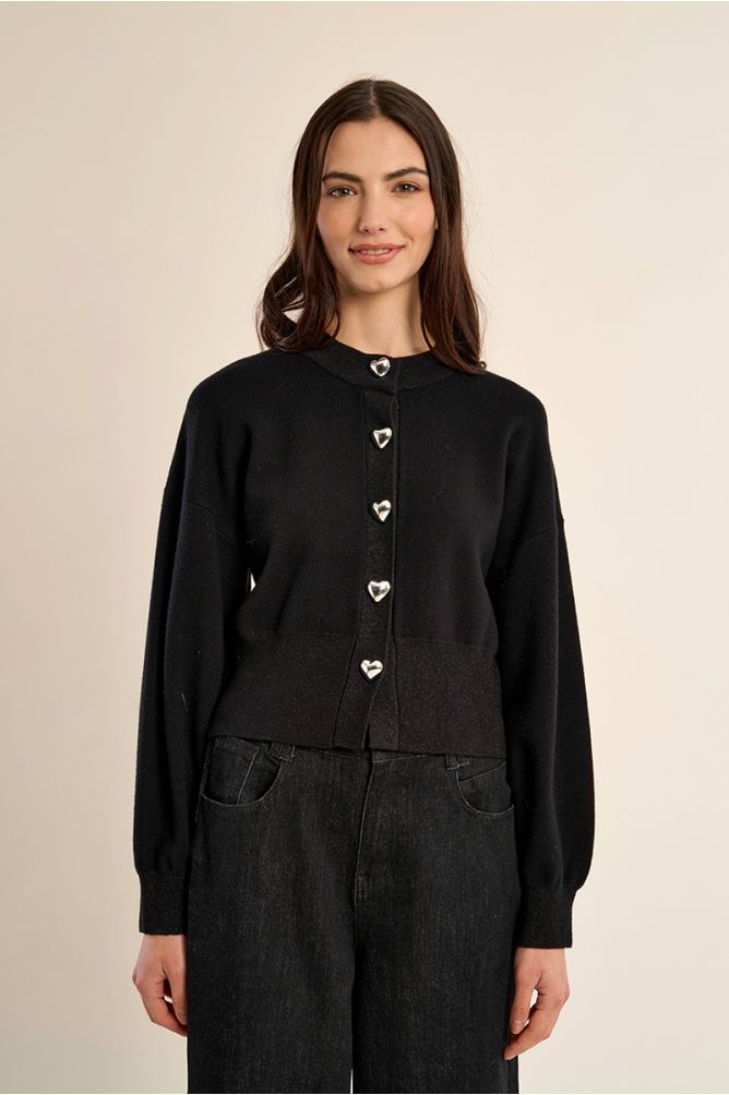 Molly Bracken black knit cardigan styled with wide leg trousers