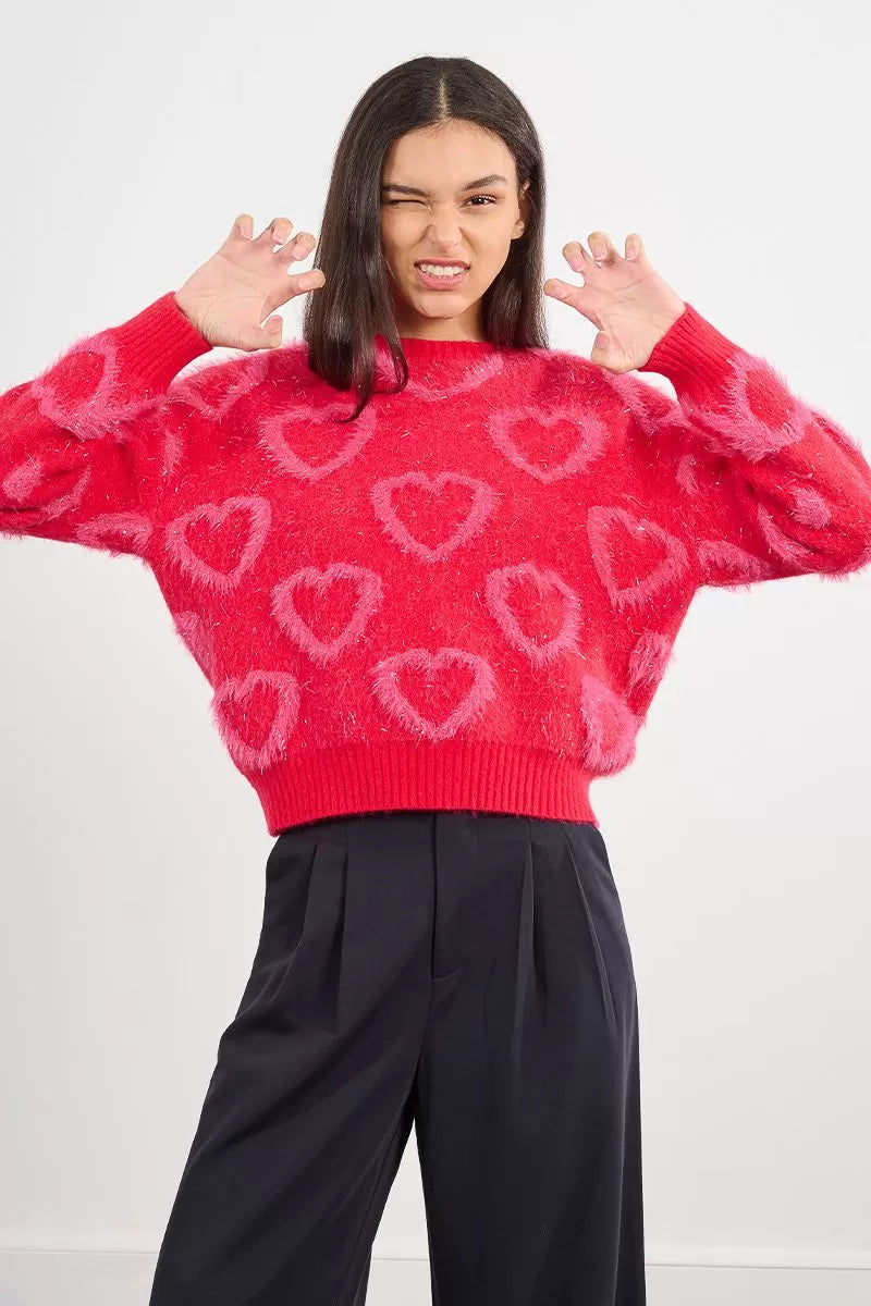 Red textured knit jumper with heart motifs styled casual