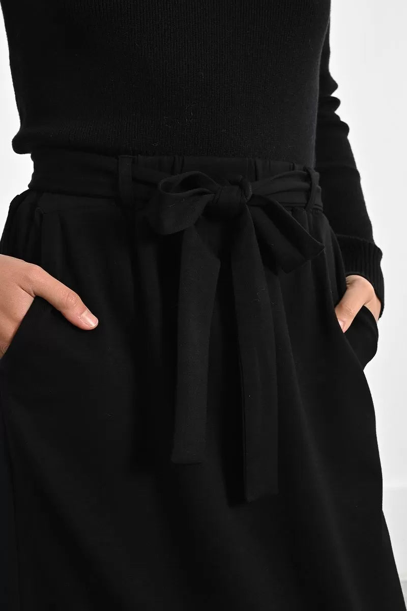 Close-up of Molly Bracken black belted skirt with pockets