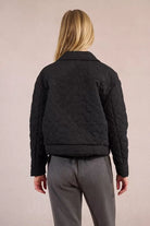 Back view of Molly Bracken quilted floral stitch jacket in black