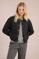 Molly Bracken black quilted jacket with gold snap buttons