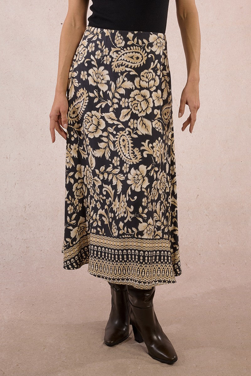 Molly Bracken long boho floral paisley skirt in black and beige, front view with border hem detail