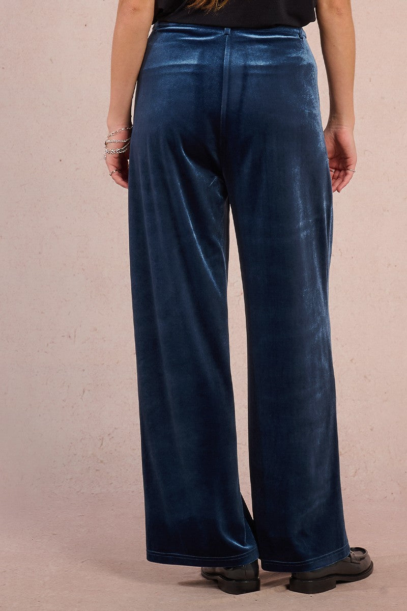 Back detail of Molly Bracken blue velvet trousers with smooth finish and wide-leg cut