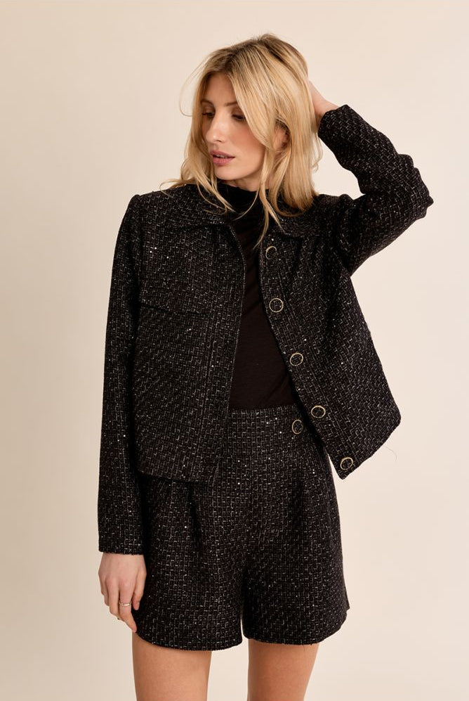 Molly Bracken black high-waisted tweed shorts styled with matching jacket
