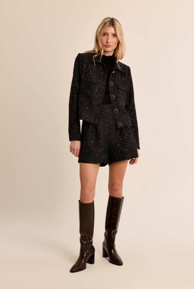 Molly Bracken black bouclé jacket styled with matching shorts