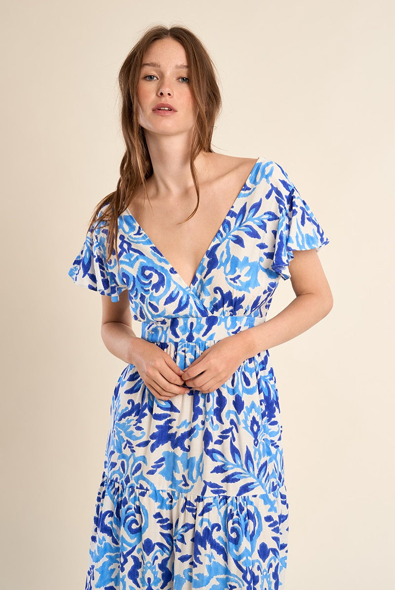 Molly Bracken V neck maxi dress with flutter sleeves and tiered skirt