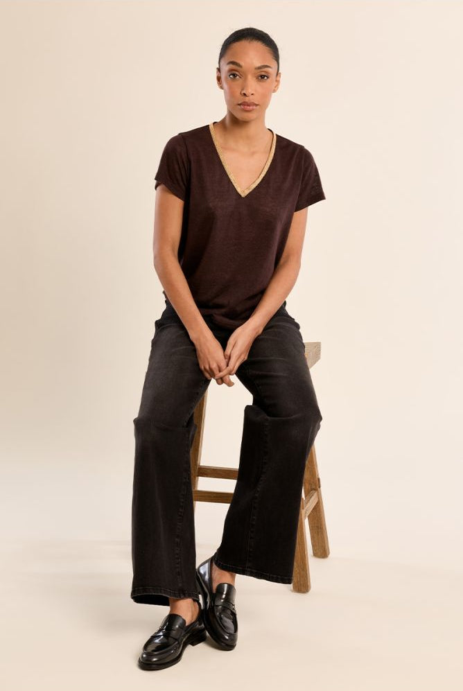 Molly Bracken brown V-neck T-shirt styled with black trousers