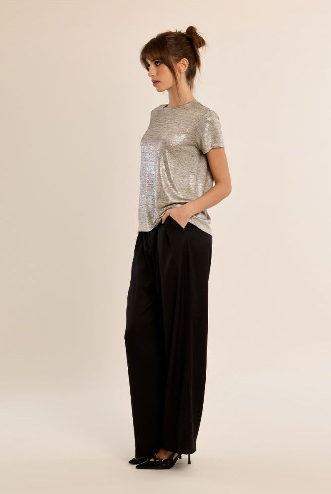 Molly Bracken beige shimmer T-shirt styled with black trousers