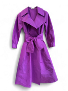 Flat lay of belted purple A-line dress for weddings and events