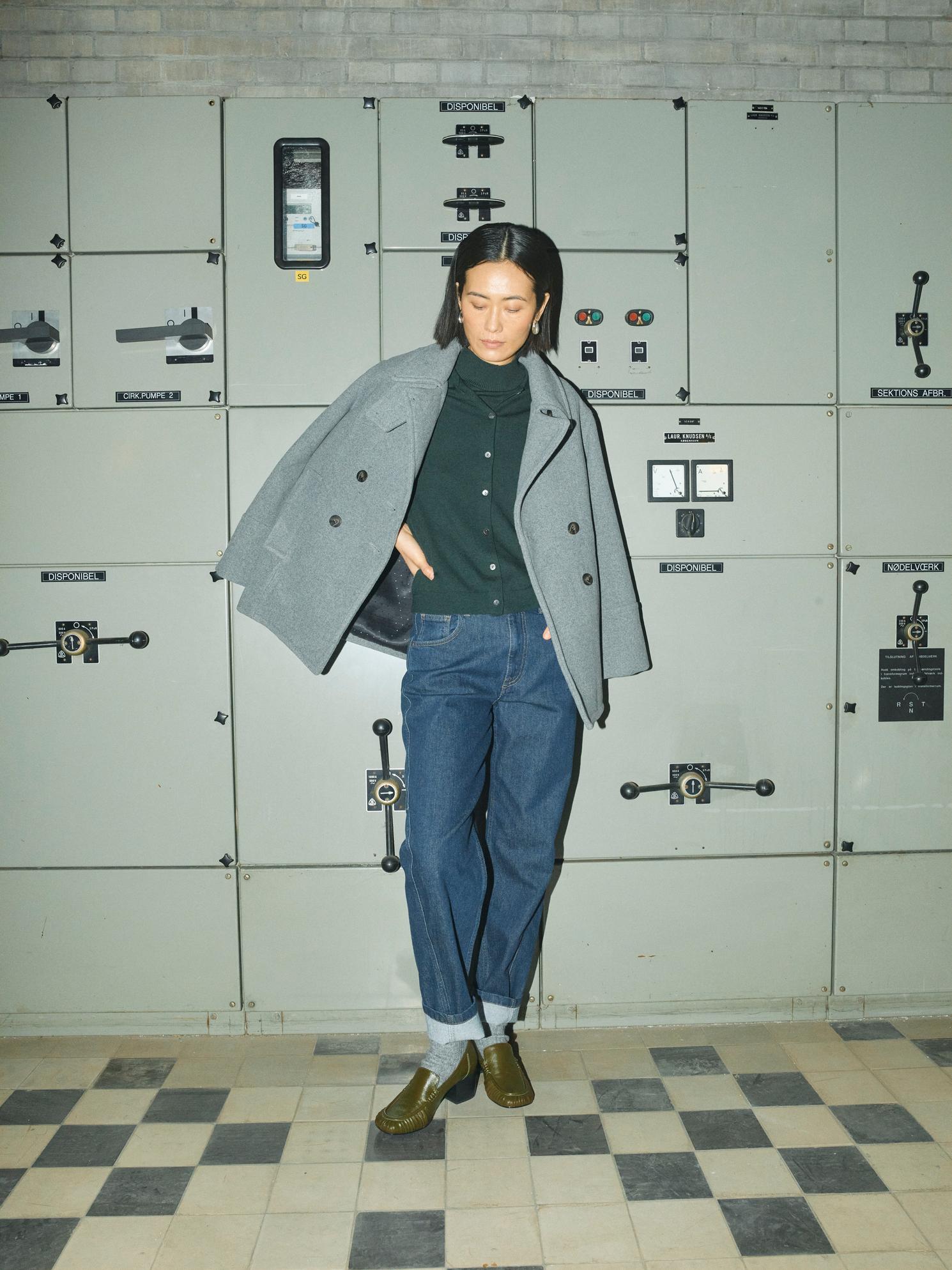 Model wearing green Mos Mosh cardigan with jeans With Jacket