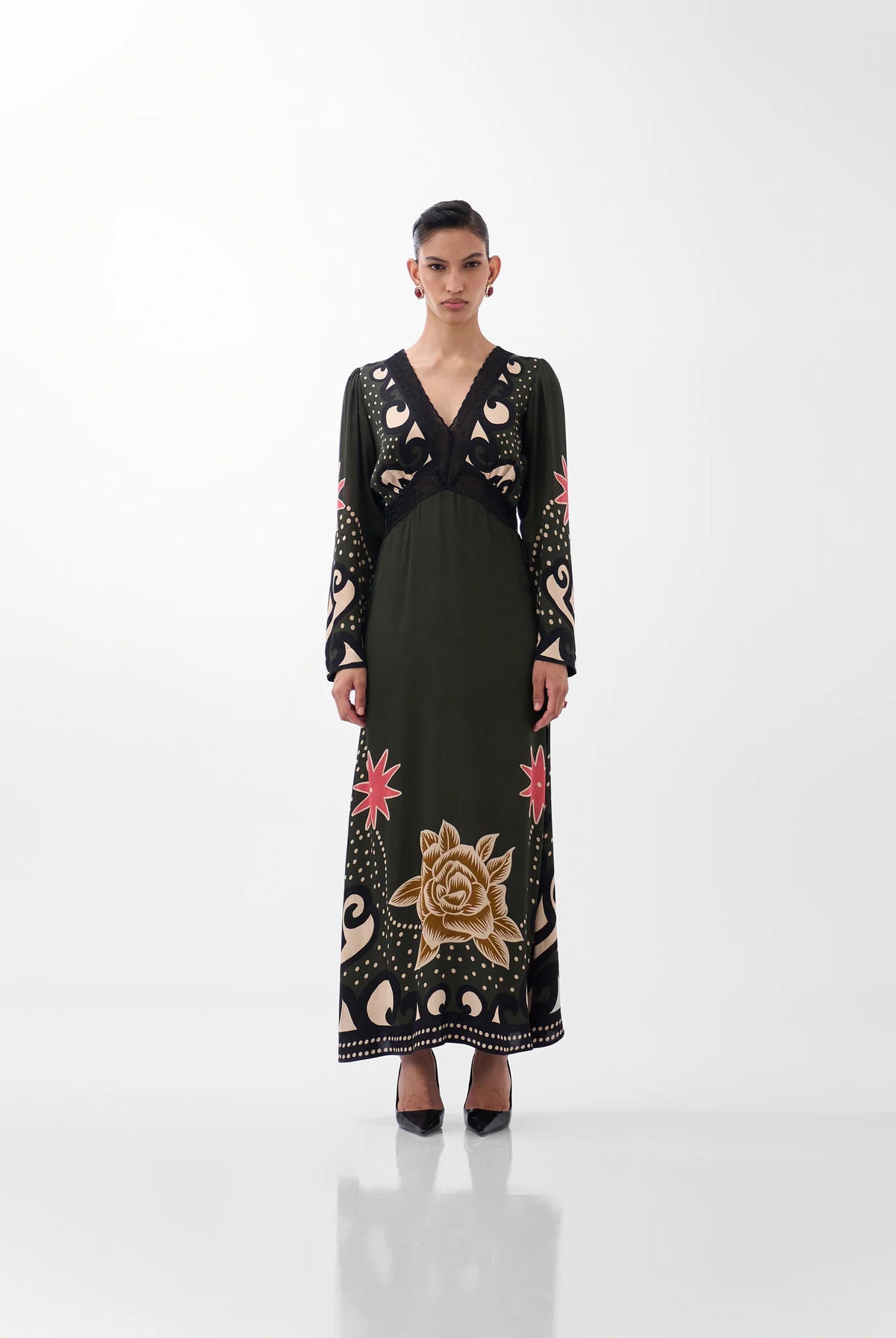 NOIB Aura Nocturnal Jungle green and black printed maxi dress with long sleeves – front model view.