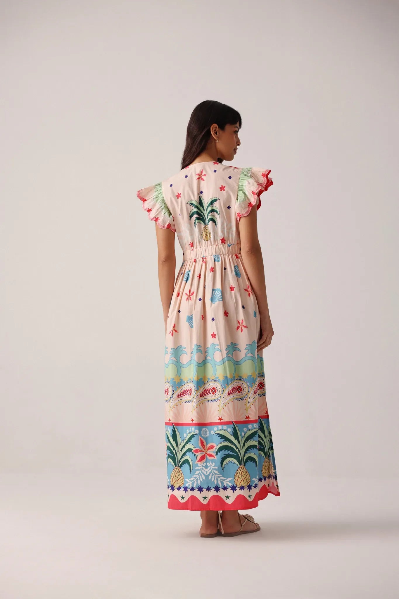NOIB Estrella pineapple print maxi dress back view with placement border print