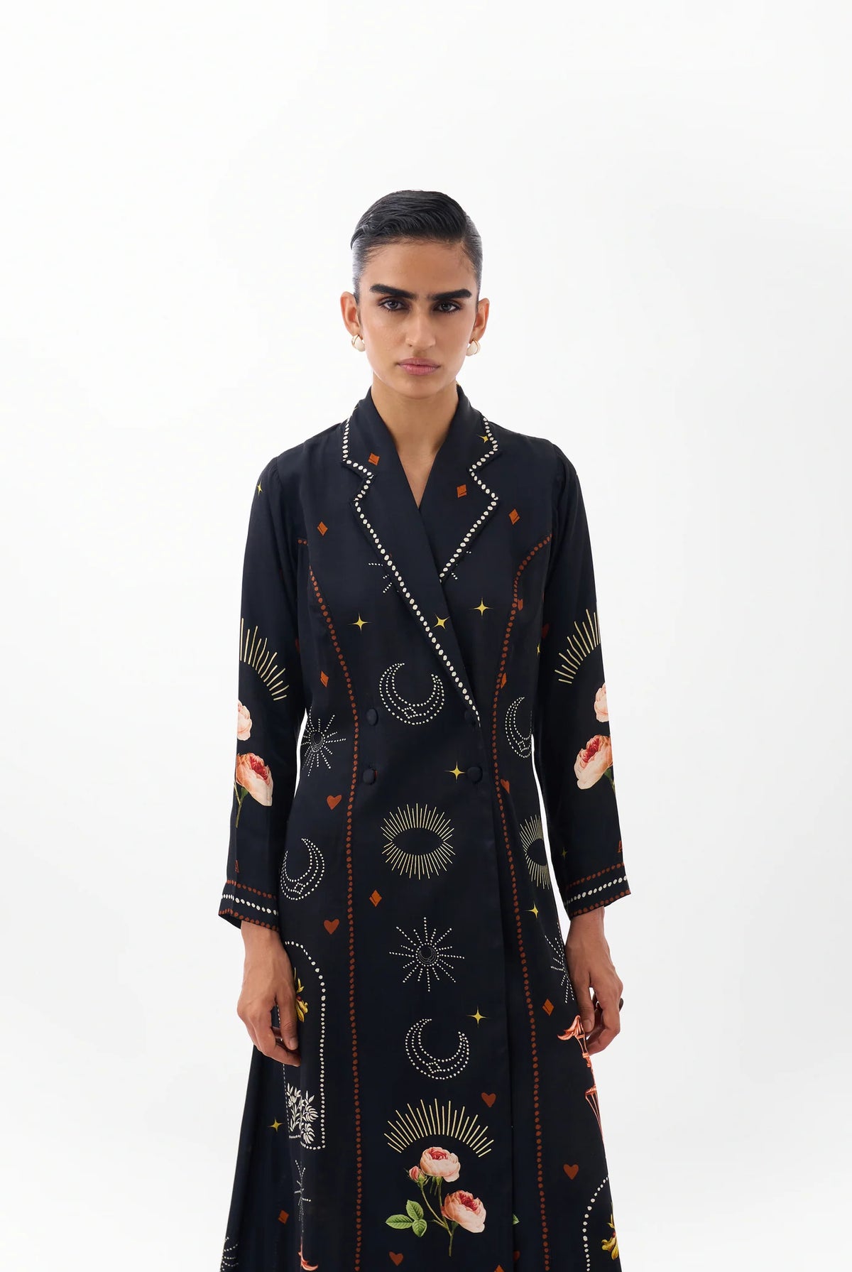 NOIB Willow black printed blazer dress with contrasting lapels and decorative motifs – upper-body model view