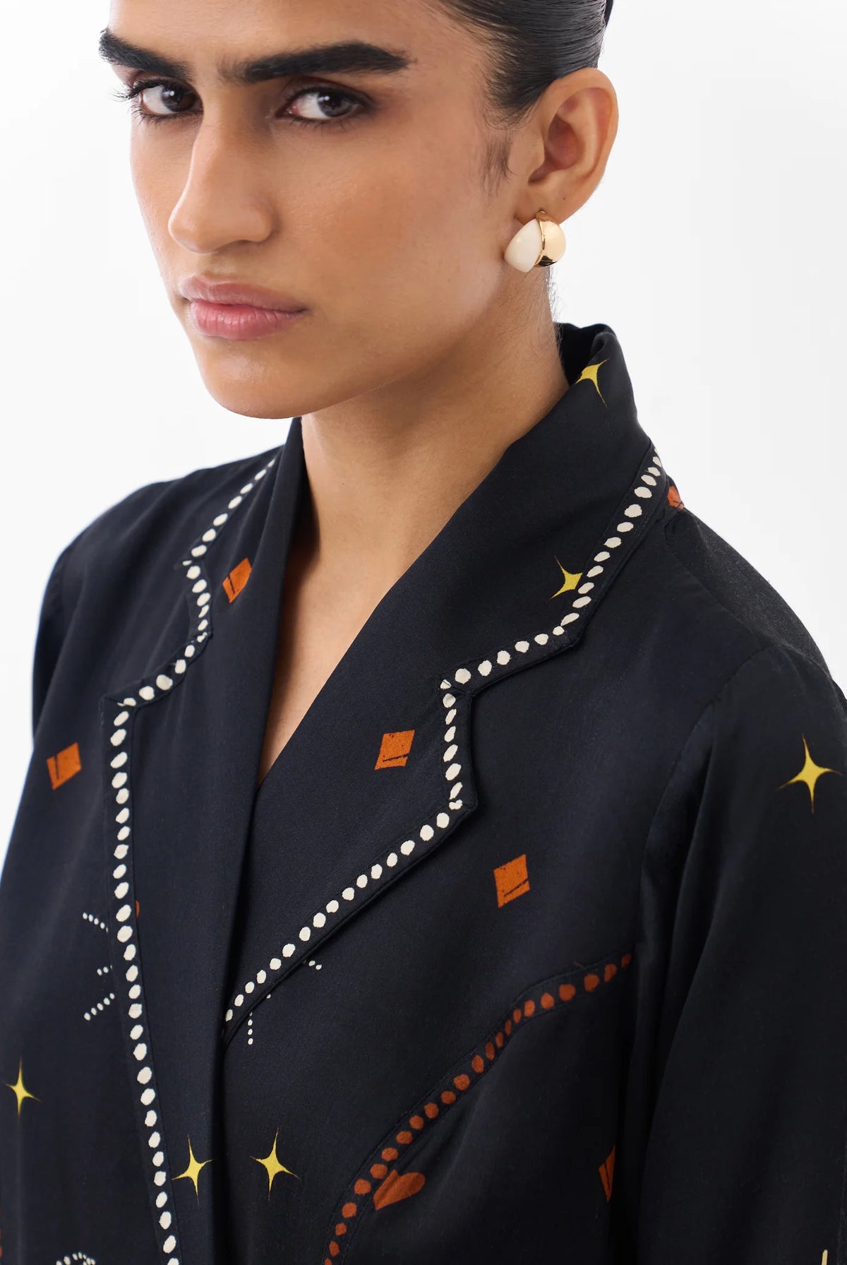 NOIB Willow Postcards & Petals dress with patterned lapel trim and button detailing – neckline close-up
