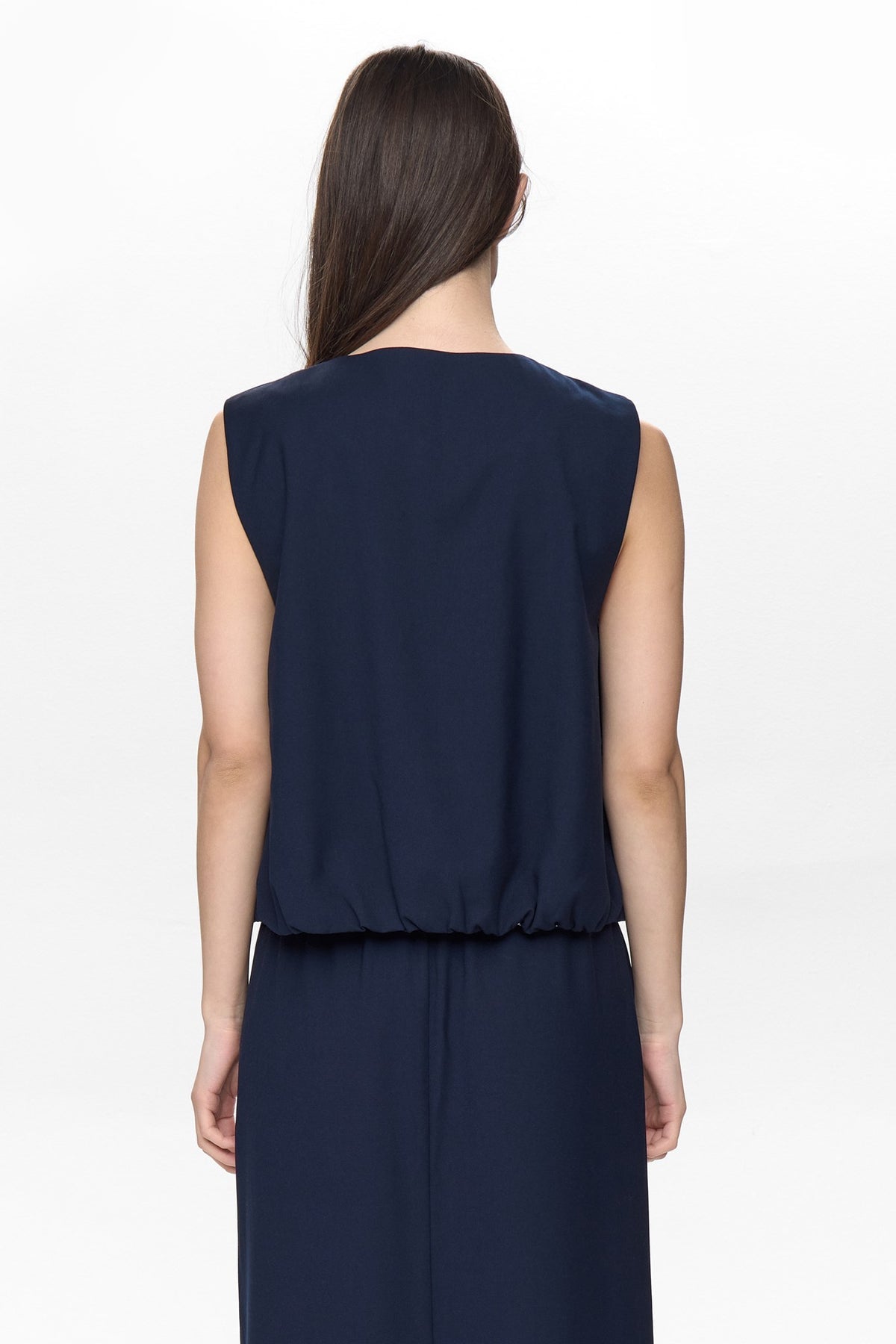 Back view of Numph Nujulia navy sleeveless zip vest top