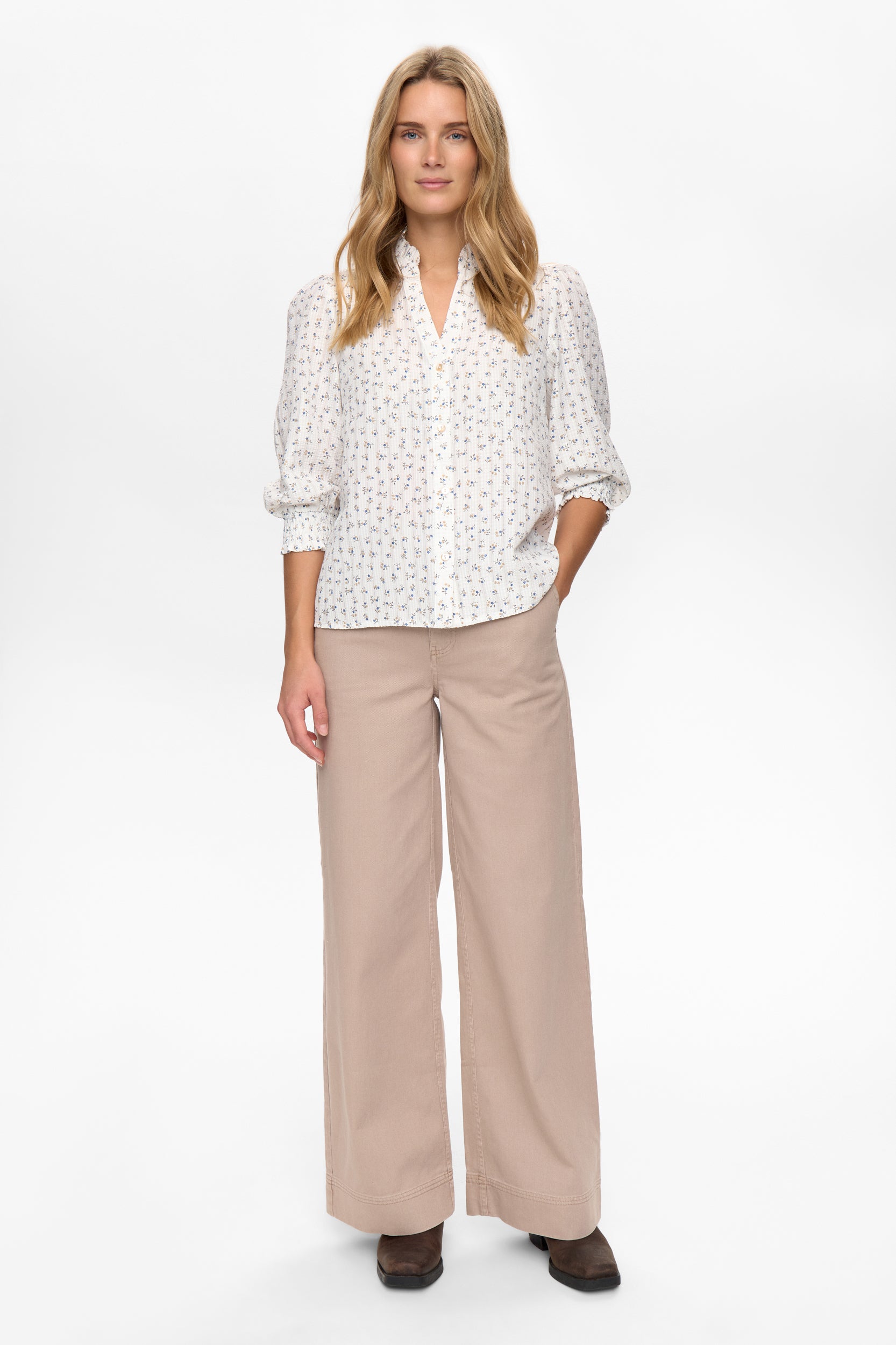 Numph Nufenja blue floral blouse styled with trousers